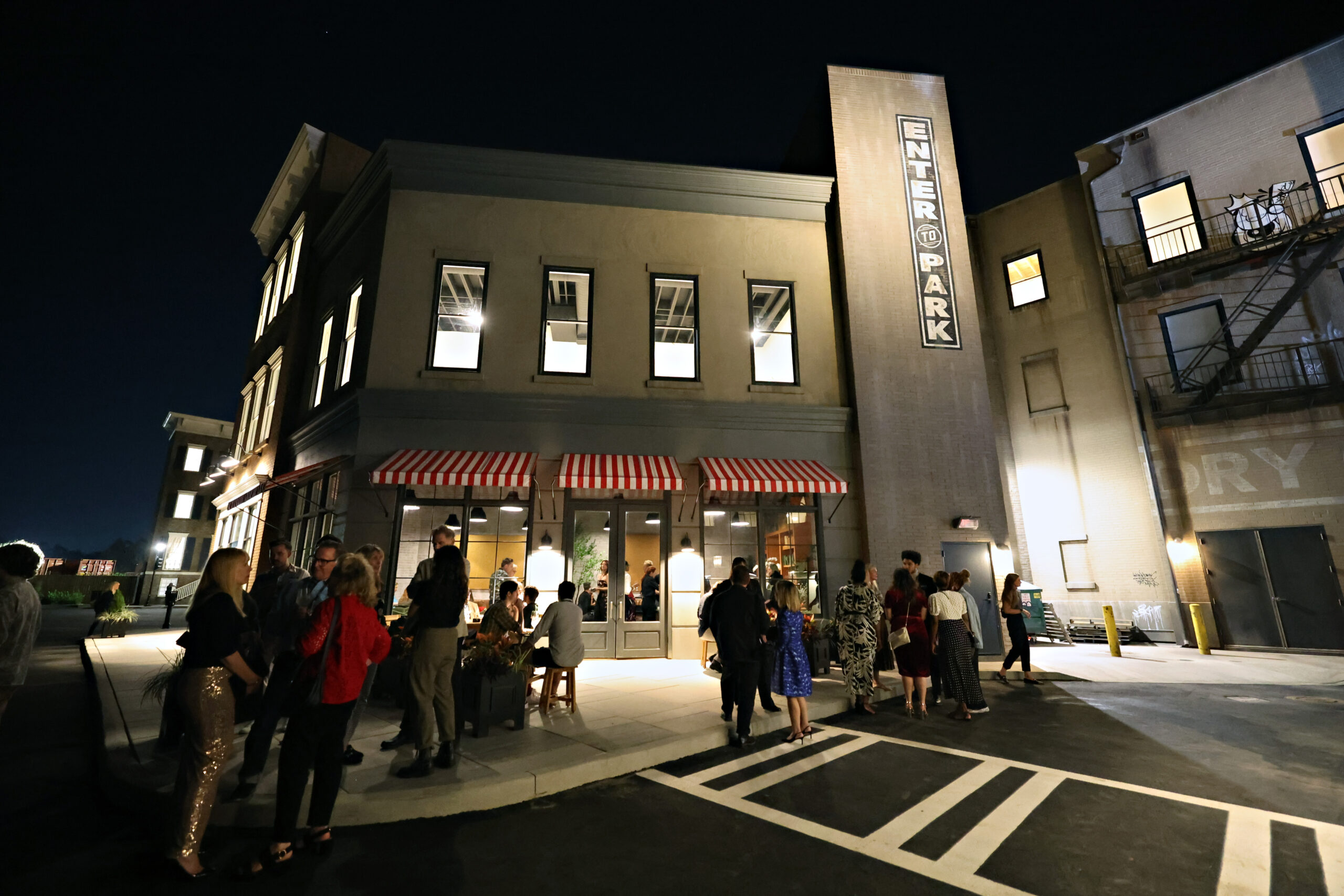 A fake restaurant on Savannah Film Studios backlot, filled with people