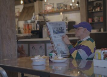 James Carville reading the paper