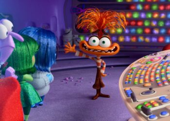 an orange creature with spikey hair and big eyes