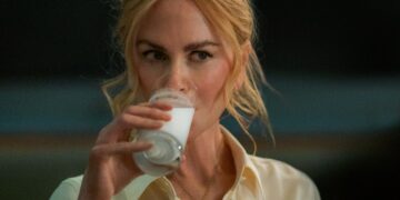a woman drinking milk