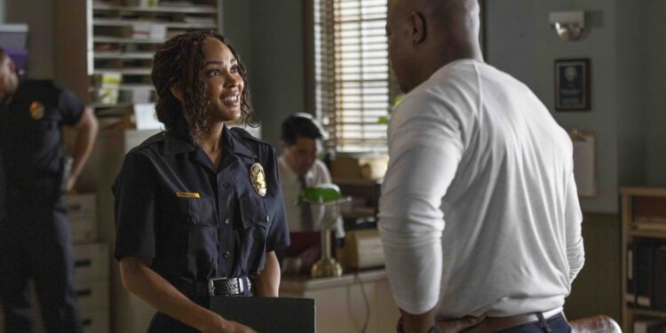 Meagan Good and Taye Diggs at the cops headquarters office