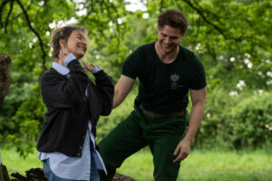 bridget jones and leo woodall outside by the trees