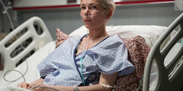 a woman in a hospital bed