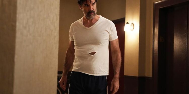 dying for sex neighbor guy rob delaney in a white shirt with a hole in it