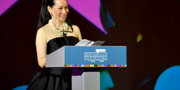 lucy liu speaks on stage at The Momentary in Bentonville, Arkansas