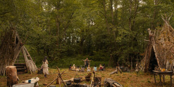 the teepees and huts in the village of Yellowjackets