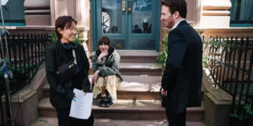 Celine Song with Dakota Johnson and Chris Evans on set of Materialists