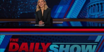 desi lydic behind the desk at The Daily Show