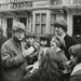 Peter Asher signs notes autographs for fans