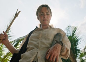 rachel mcadams stands on a beach in send help