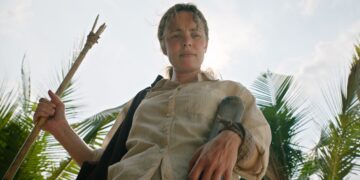 rachel mcadams stands on a beach in send help