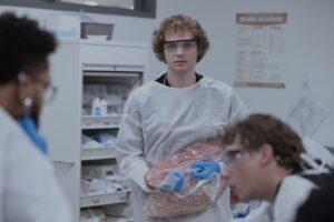 the pitt ogilvie stands in an operating room 