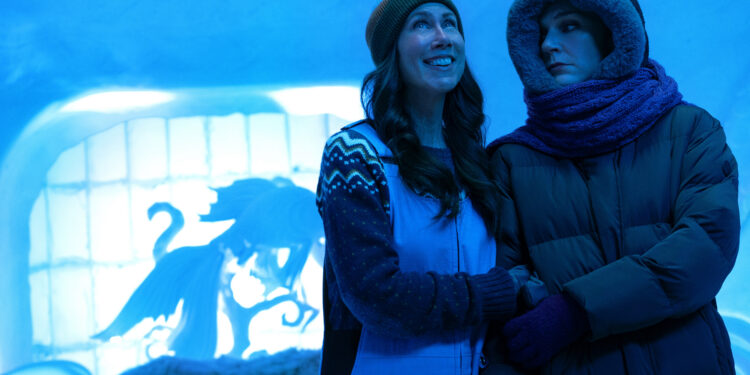 two characters stand in an ice hotel on pluribus