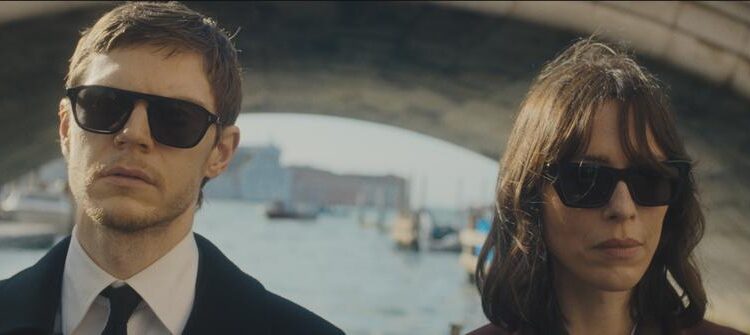 the beauty rebecca hall character jordan stands next to evan peters' cooper