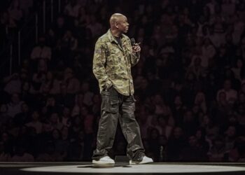 dave chappelle on stage in a colin kaepernick jacket