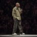 dave chappelle on stage in a colin kaepernick jacket