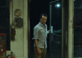 matthew rhys as tom loftis enters a convenience store on widow's bay