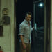 matthew rhys as tom loftis enters a convenience store on widow's bay