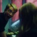Primetime film still featuring Robert Pattinson making a face to someone in the bathroom